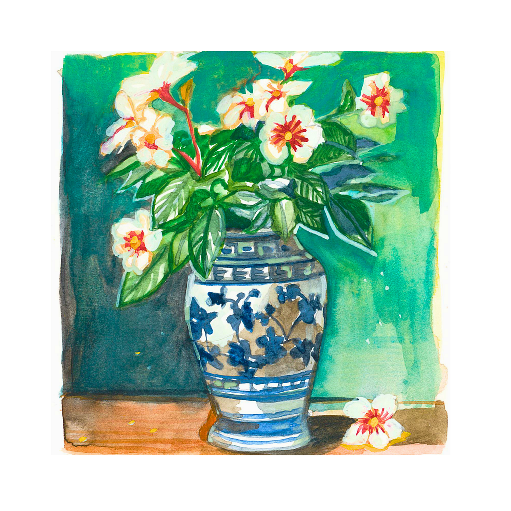 Floral arrangement in a decorative ceramic vase.