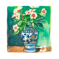 Floral arrangement in a decorative ceramic vase.