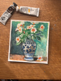 Vase with flower arrangement